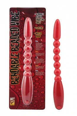 Гибкий вибратор, выполнен в виде цепочки бусин по центру и овальных наконечников с обеих сторон.