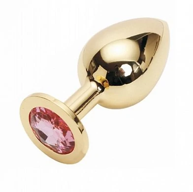 Анальная втулка большого размера с кристалом розового цвета. Изготовлен из медицинской стали с позол