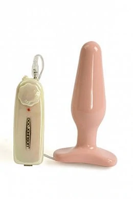 Анальная пробка телесного цвета с вибрацией.